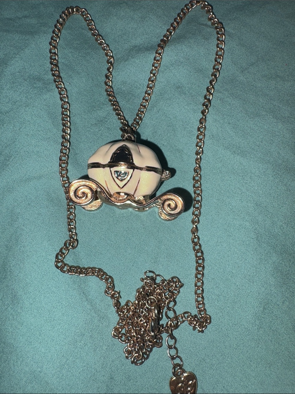 Gold-tone Carriage Pendant Necklace with White Accent
